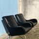 2 vintage faux leather armchairs