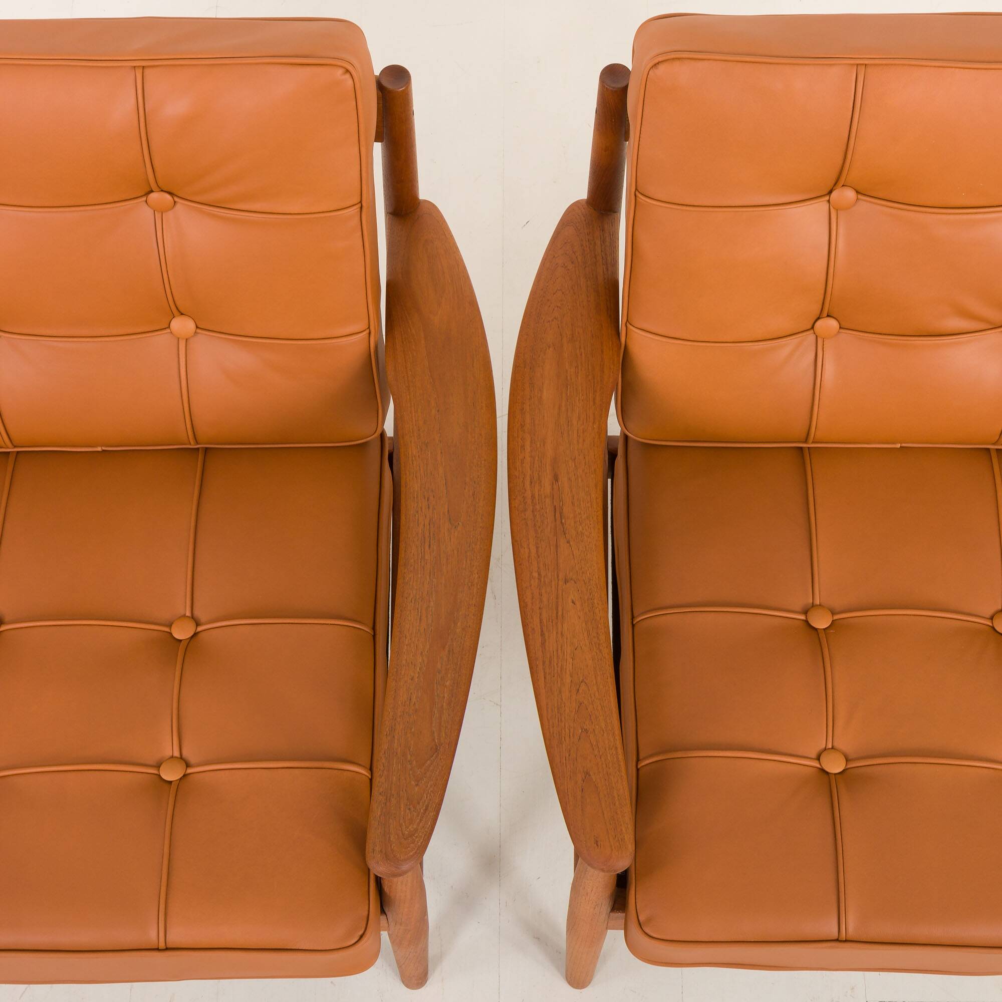 Rare Grete Jalk teak lounge chairs in aniline cognac leather for Cado