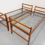 Pair of vintage stackable daybeds in oak wood and metal from the 60s