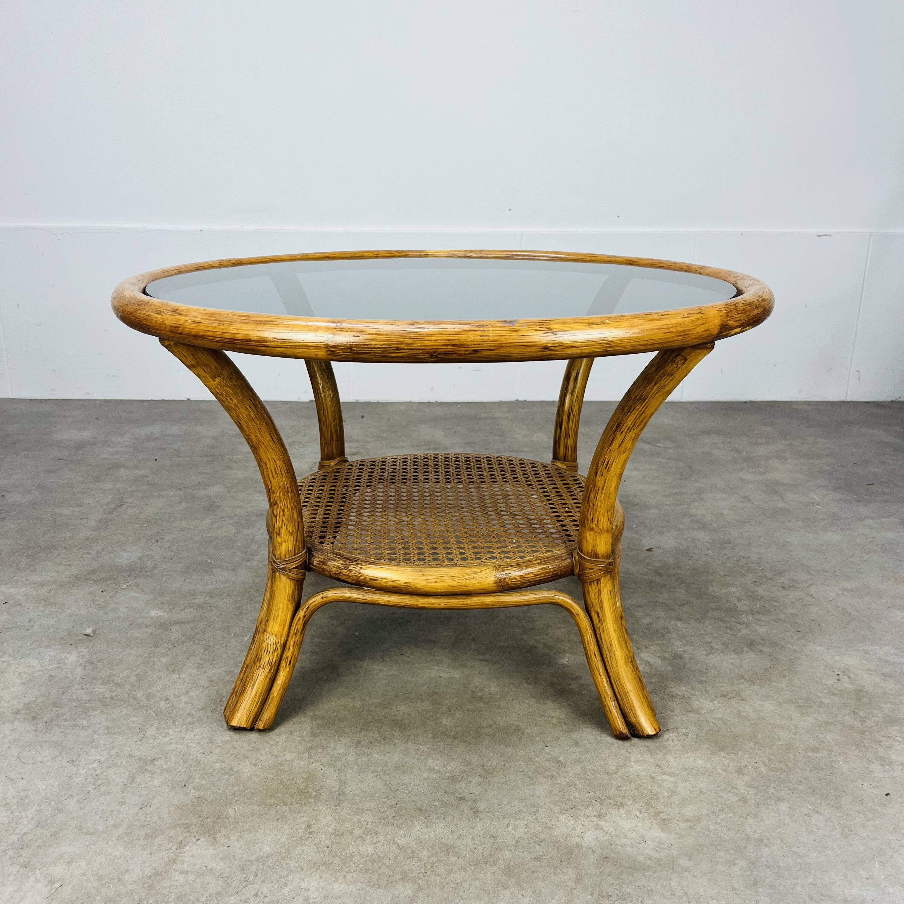 Round rattan smoked glass coffee table, 60s
