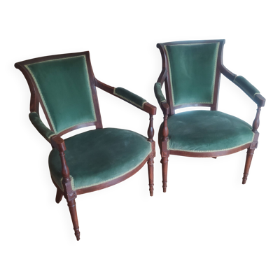 paire de fauteuils Directoire en noyer début XIXème velours vert