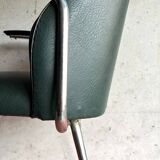 Vintage green faux leather and chrome armchair