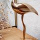 Golden brass heron