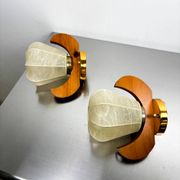 Pair of pear-shaped "Cocoon" wall sconces, resin and pine wood, Italy, circa 1970s
