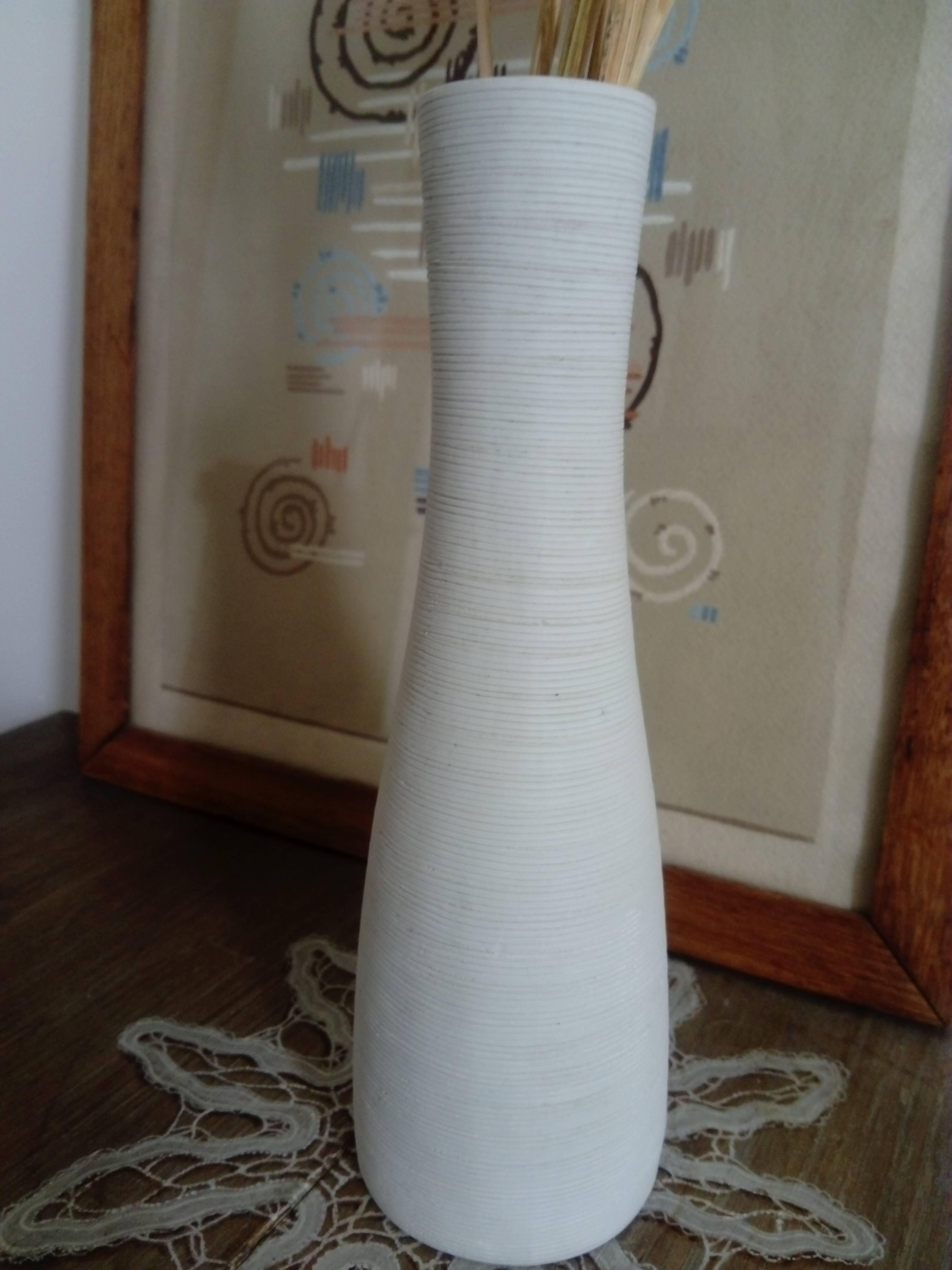 White ceramic vase with fine streaks