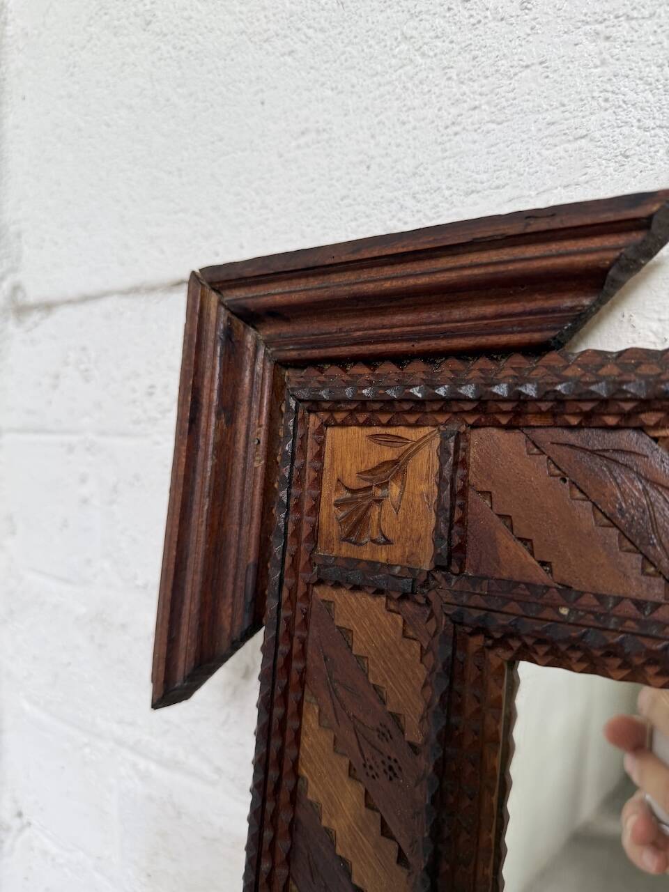 Pair of wooden mirrors in tramp art style