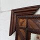 Pair of wooden mirrors in tramp art style