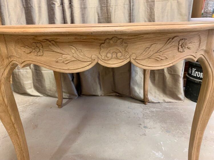 Round solid oak dining table