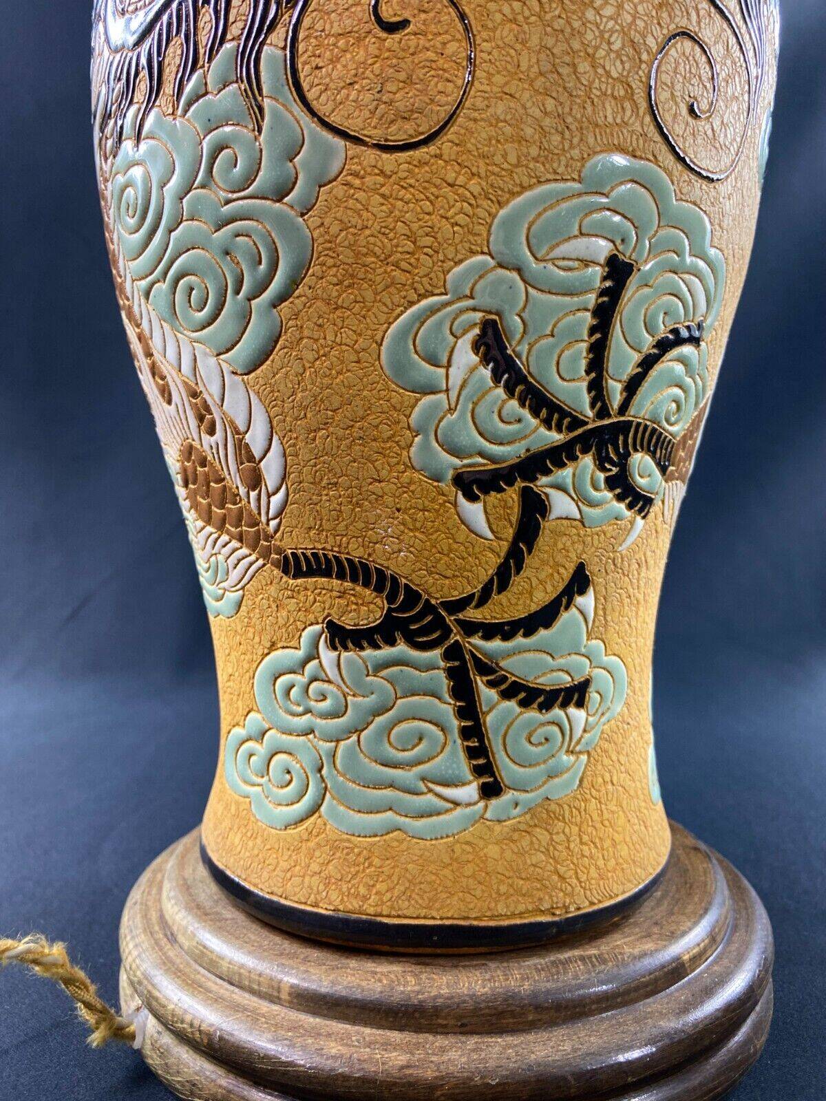 Very large dragon lamp on a yellow background in well-fired Vietnamese stoneware.