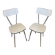 Pair of antique chrome metal chairs + white formica seat & back
