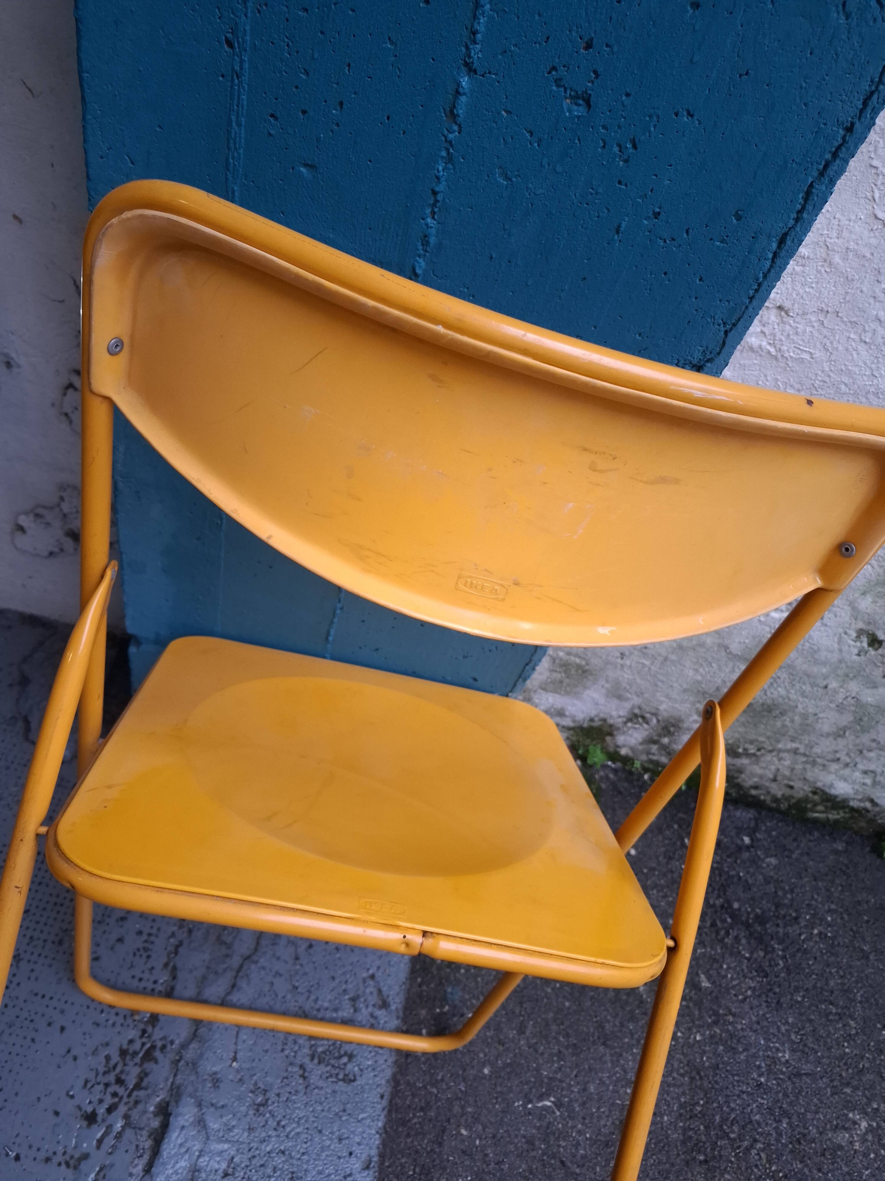 Two ikea folding chairs, niels gammelgaard