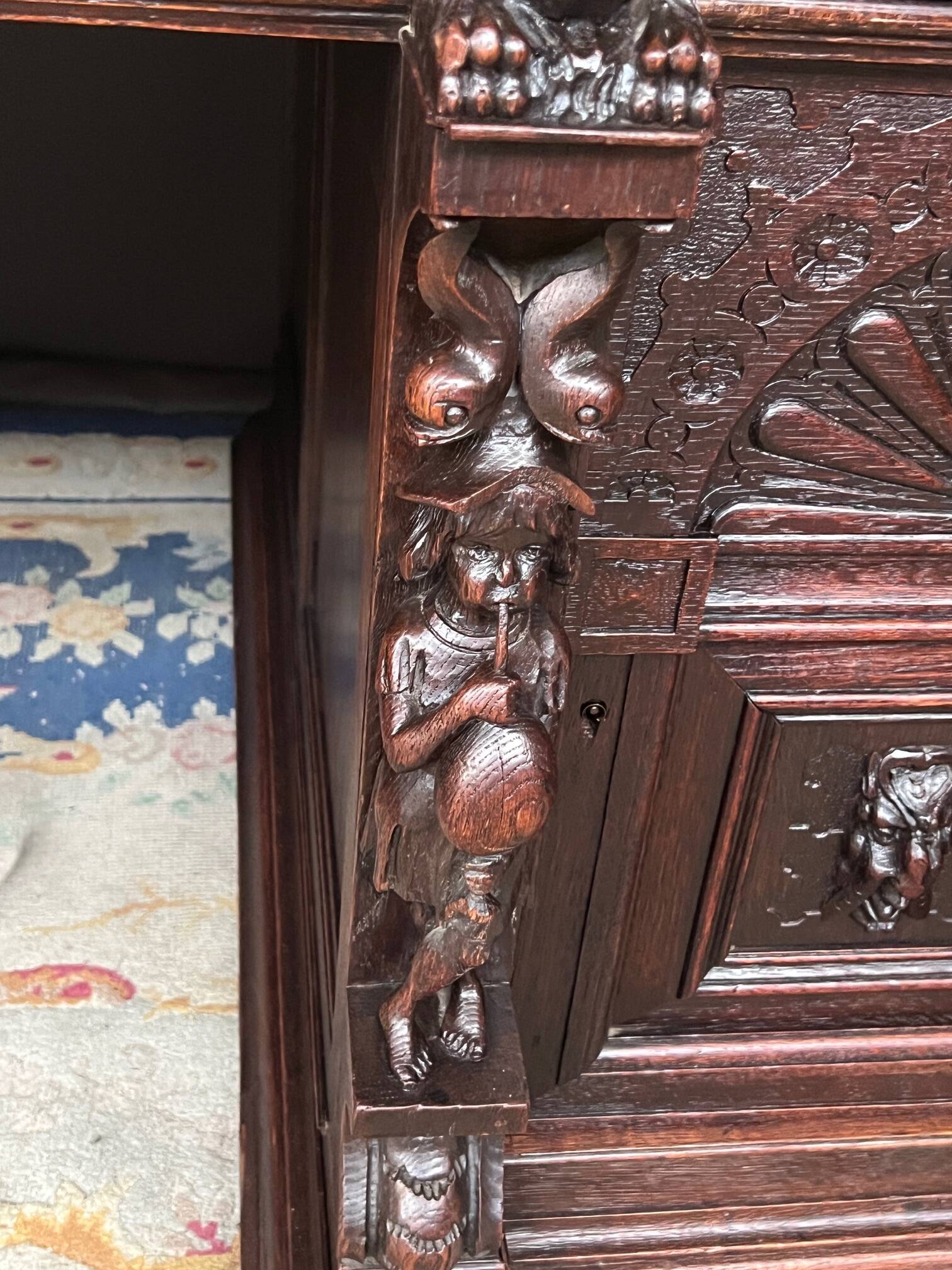 Old Renaissance style desk. Solid oak. France. Late 19th century.