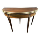 A Louis XVI period mahogany half-moon table forming a console/games table