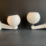 Pair of Art Deco porcelain wall lights with white Opaline globes, 1920