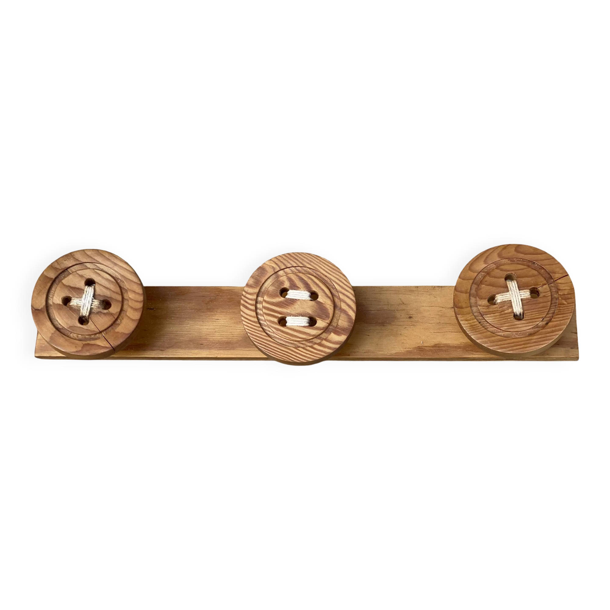 Vintage 1980 coat rack with 3 "button" hooks.