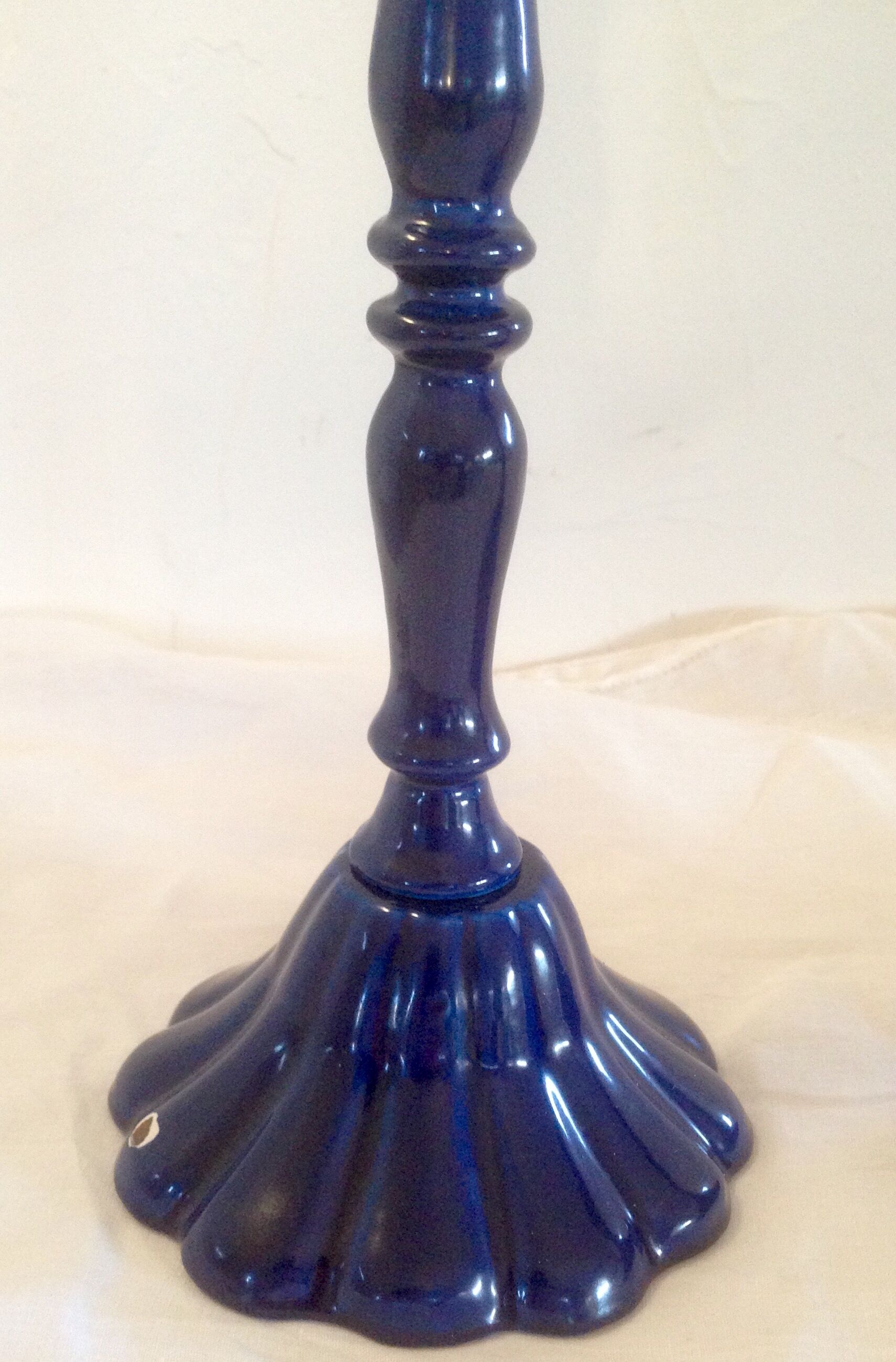 Vintage enameled cast-iron candleholders