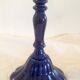 Vintage enameled cast-iron candleholders