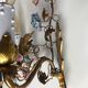 Two bronze wall light decorated with flowers in german porcelain