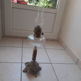 Kerosene lamp. Rerre, marble and silver regulates with face patterns.