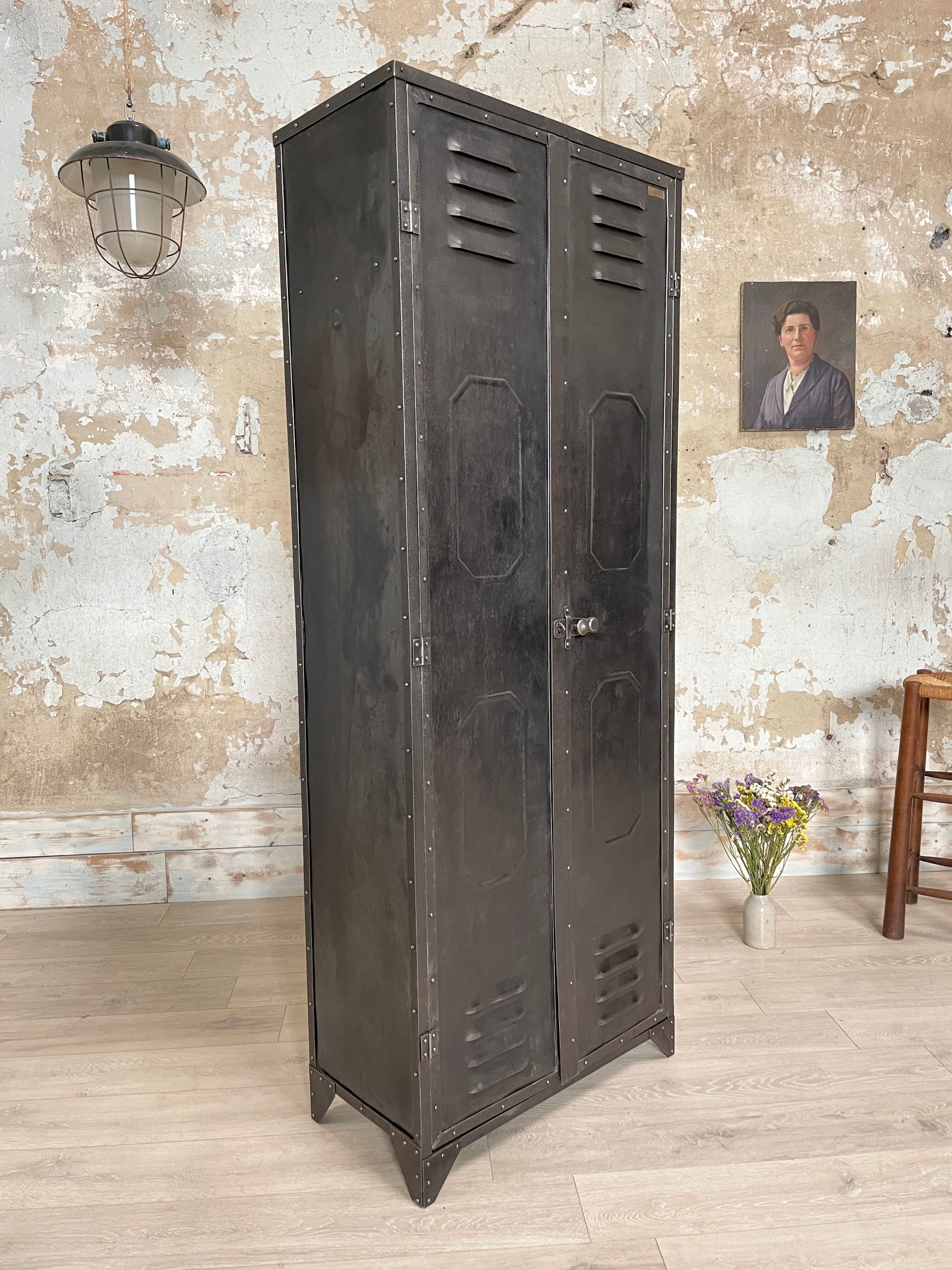 Industrial locker room in raw metal, circa 1930.