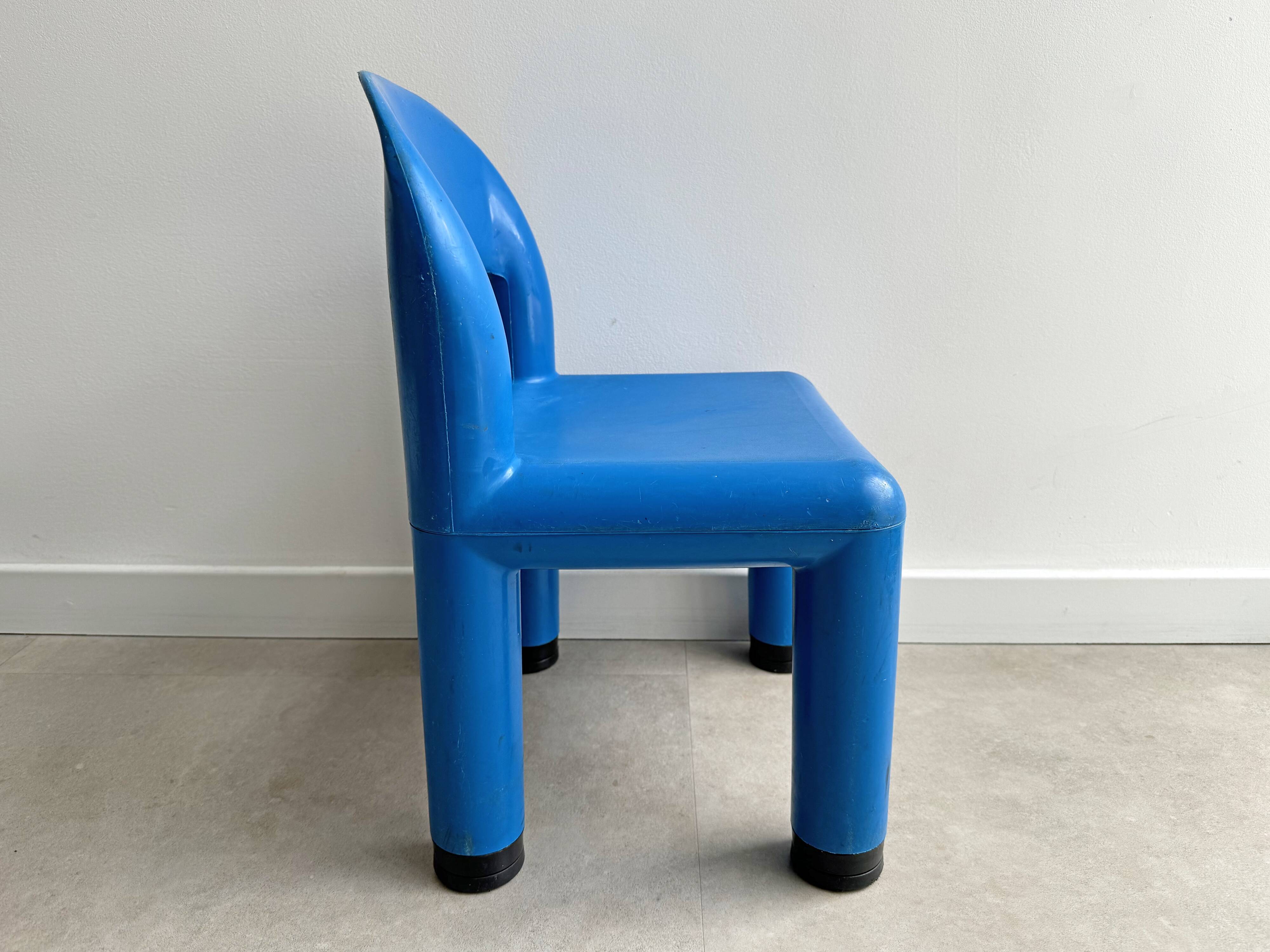 Blue plastic space age kids chair, bold italian design