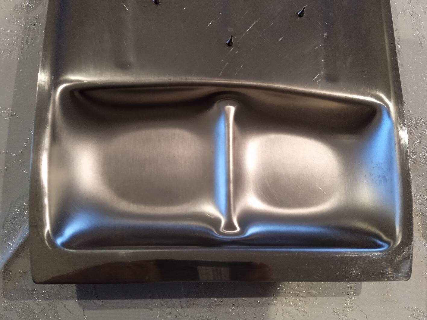 Stainless steel lamb dish