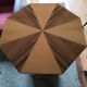 Postmodern octagonal gueridon in sycamore and rosewood, 1980–1990