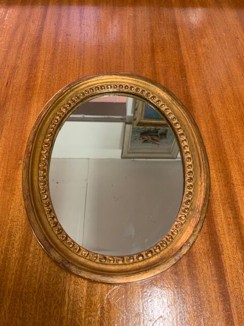 Golden mirror with pearl ring, 31x24 cm