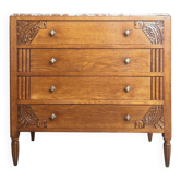 Art Deco commode with marble top, vintage antique furniture.