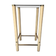 Square side table in metal and smoked glass.