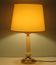 Impressive lamp with white ceramic stem and 1970 brass base