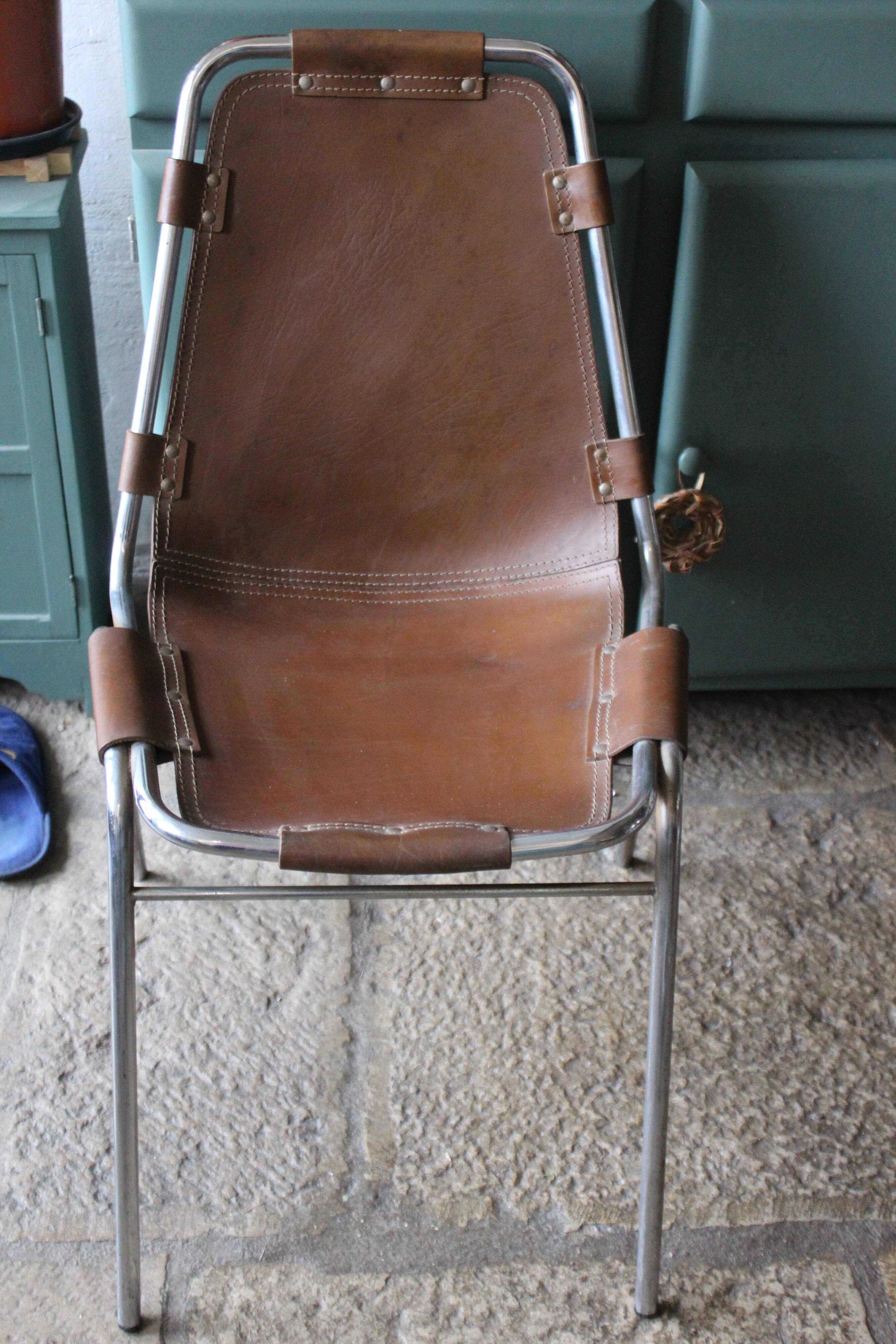 Leather and metal arch chairs