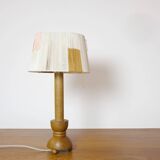 Wooden candle holder mounted as a lamp and its rope shade, 47.5cm.