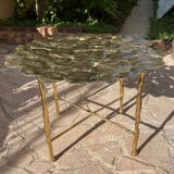 Carved brass coffee table with ginkgo decor