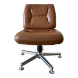 Pair of cognac-colored swivel armchairs