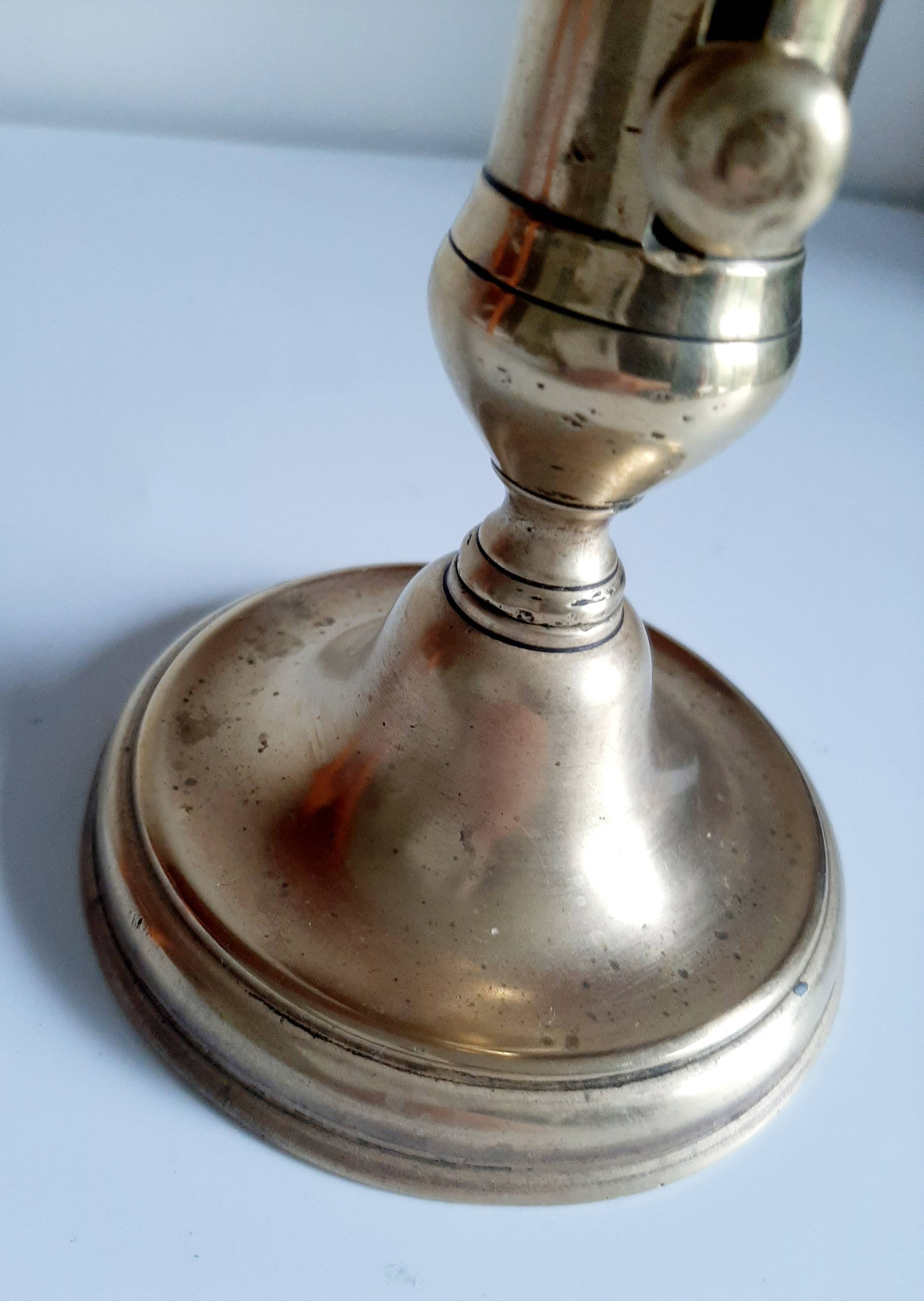 Golden brass candle holder