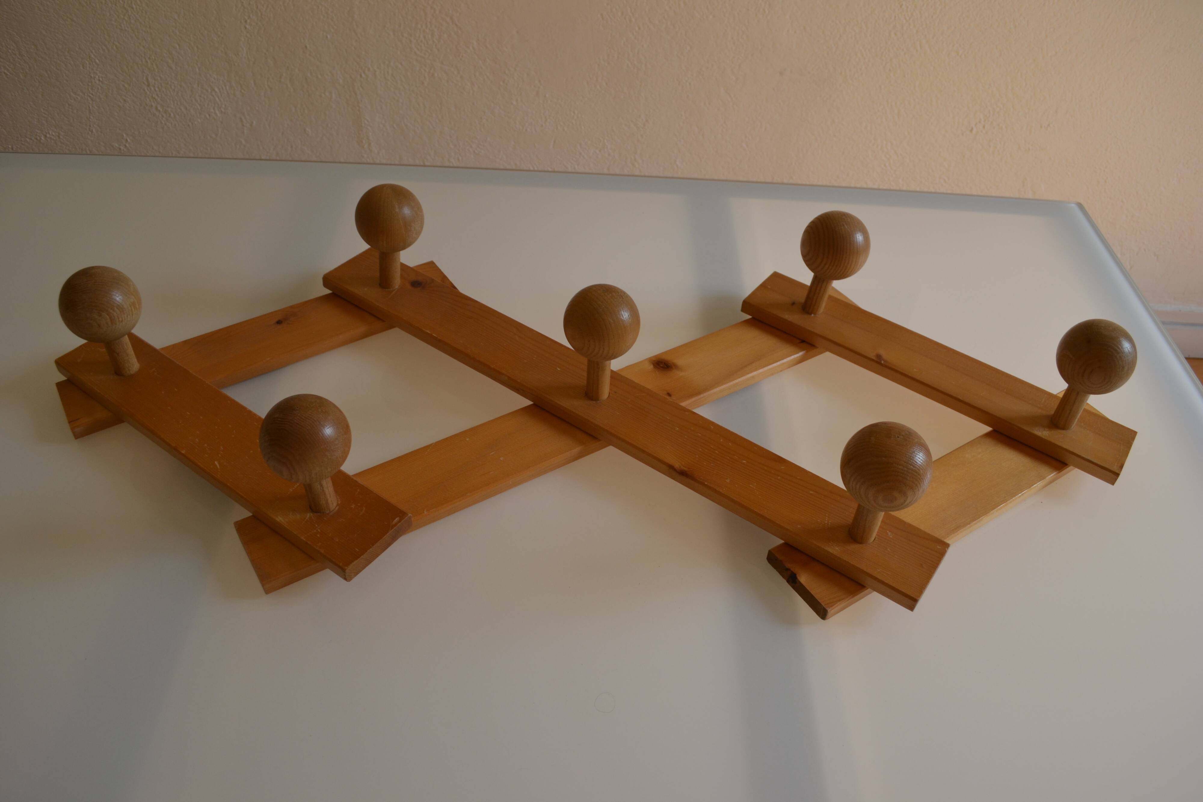 Brutalist wooden accordion wall coat rack with 7 hooks