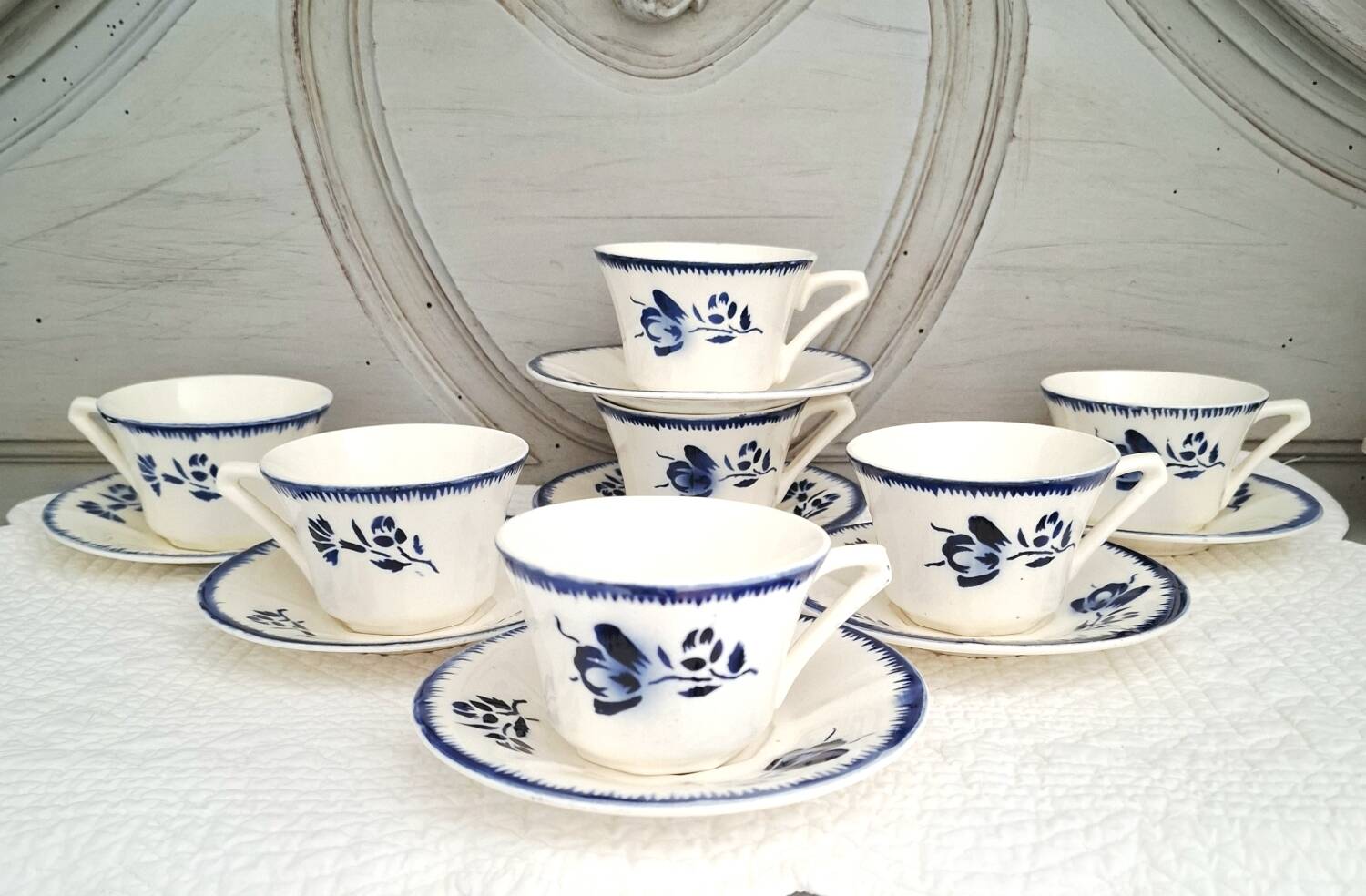Antique cups with iron earthenware saucers