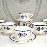 Antique cups with iron earthenware saucers