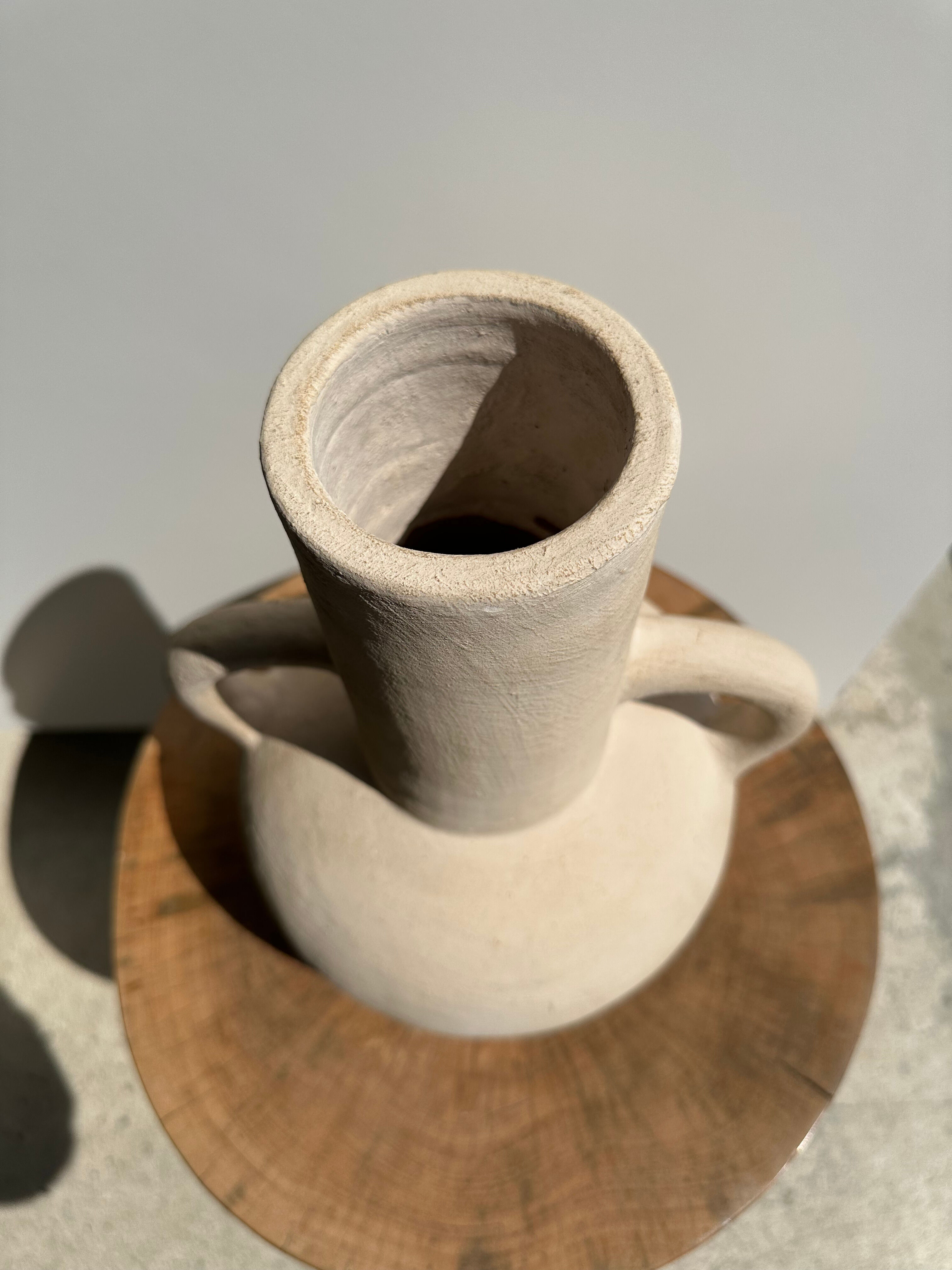 Handmade terracotta vase painted in beige with double handles h:32 d:25