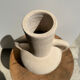 Handmade terracotta vase painted in beige with double handles h:32 d:25