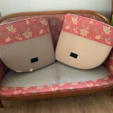 Art Deco style sofa, covered in Indian fabric with a pink background