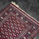 Handwoven red Boukhara oriental rug, 1960s