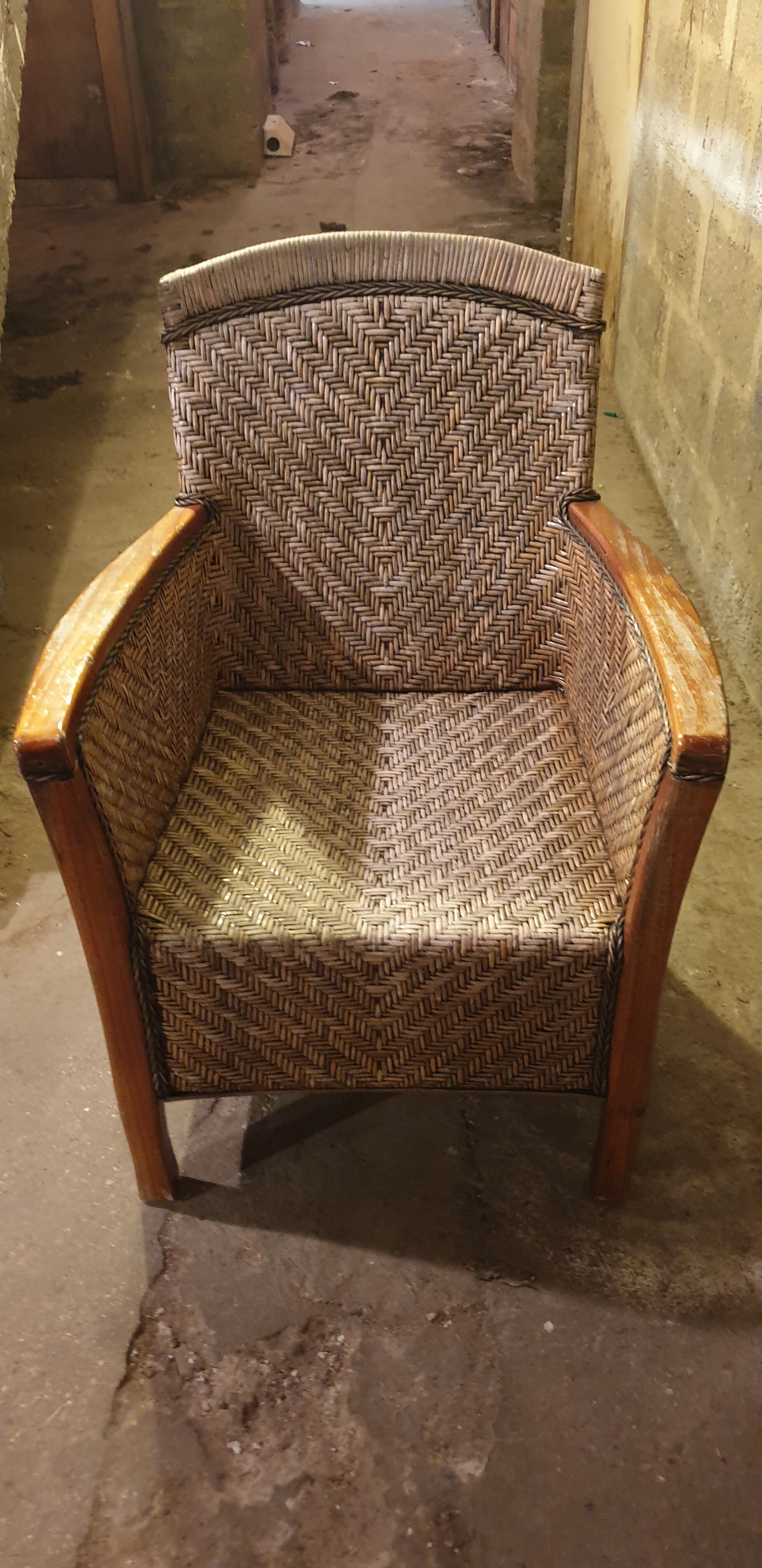 Rattan and wood armchair