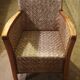 Rattan and wood armchair
