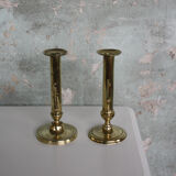 Pair of brass push-up candlesticks