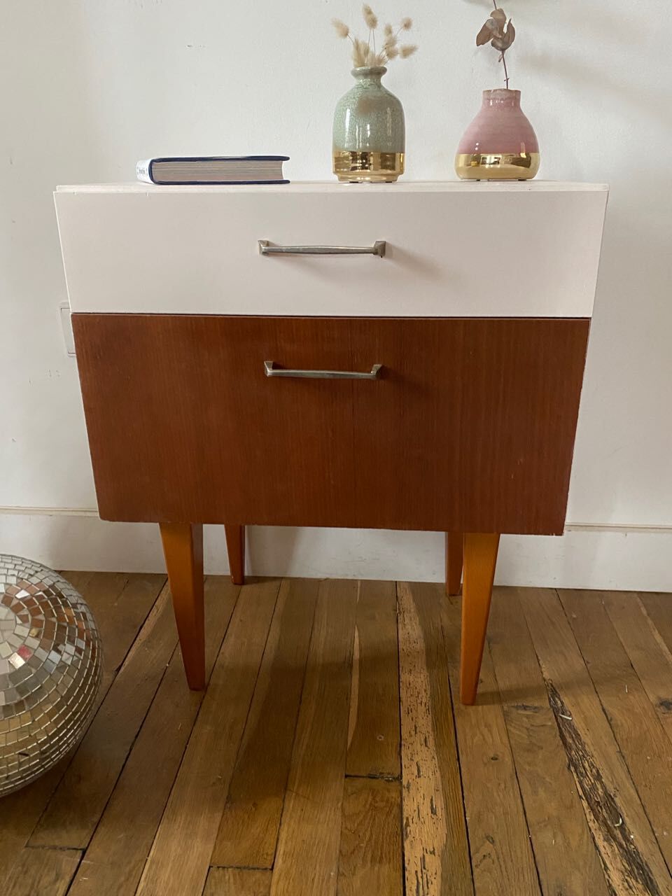 Wooden bedside table and nude