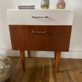Wooden bedside table and nude