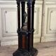 A pedestal table in blackened wood and burl veneer, superb assembly of moldings circa 1880