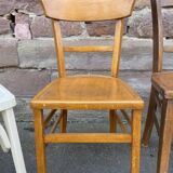 4 mismatched curved wooden bistro chairs